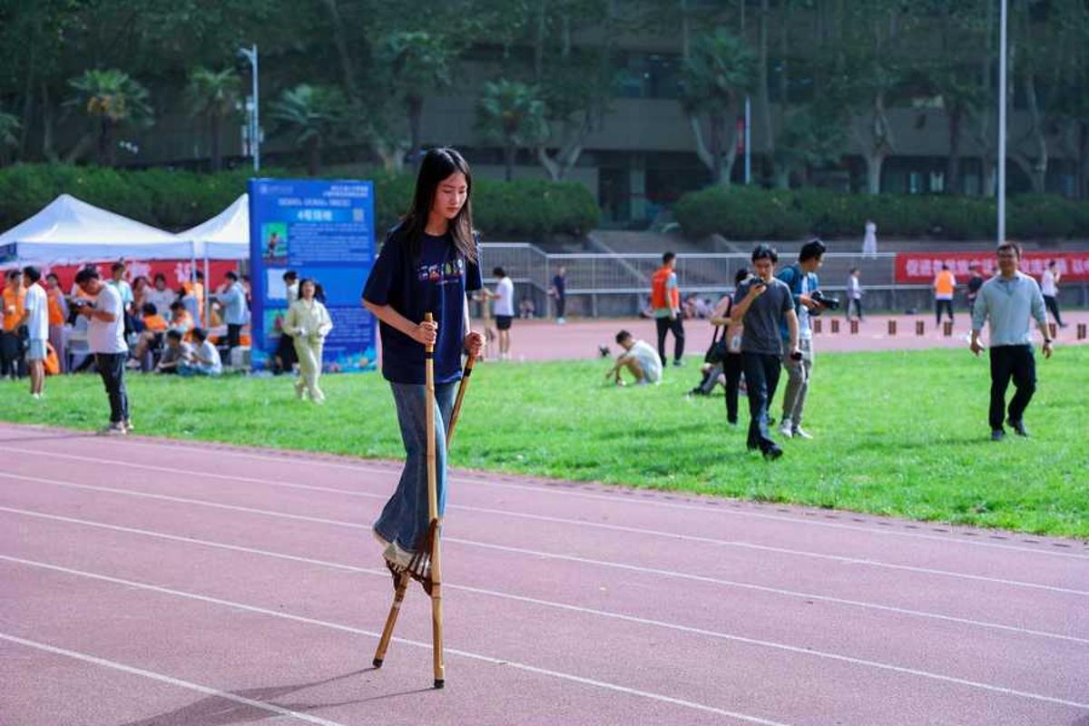 西安交通大学第四届少数民族传统体育运动会举行(图8)